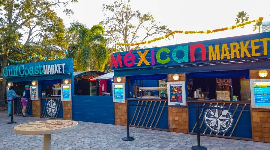 Two booths set up for SeaWorld Orlando's Seven Seas Food Festival. The Gulf Coast Market booth is on the left, and the Mexican Market booth is on the right.